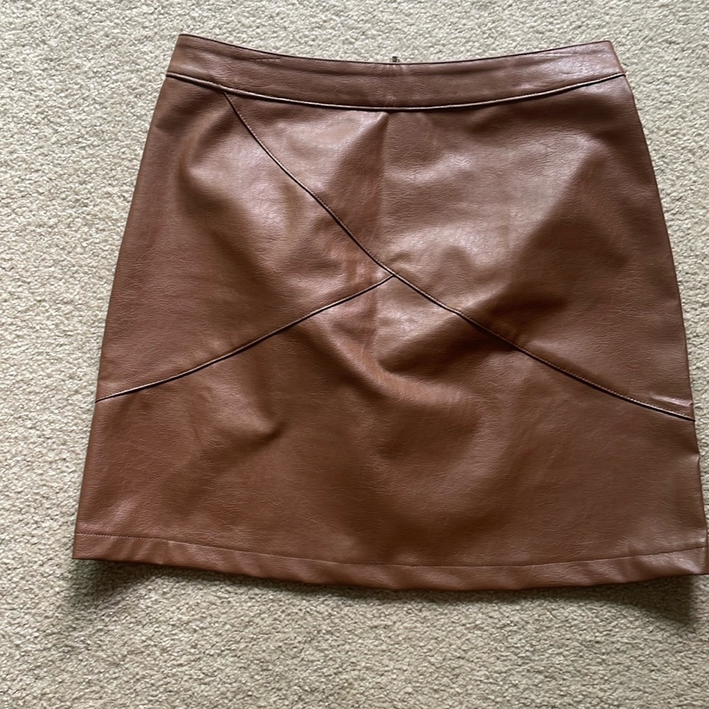 Brown pleather mini skirt.